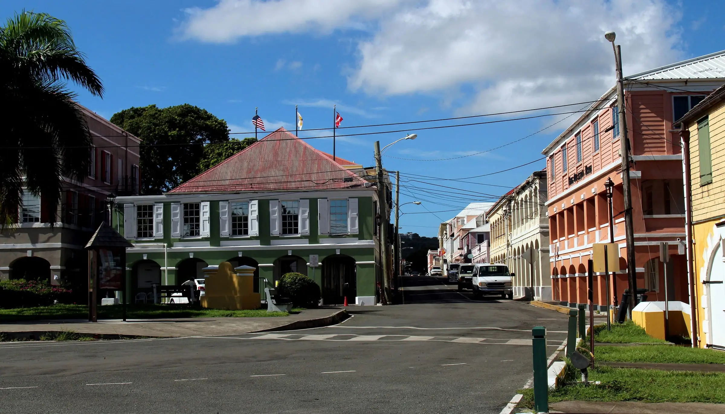Historic buildings with shuttered windows on a quiet street in downtown Christiansted