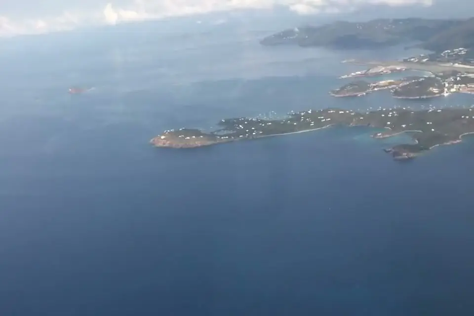 The south coast of St. Thomas and its offshore islands, seen from an airplane window shortly after takeoff